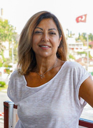 Специалист-психолог Şebnem Akı